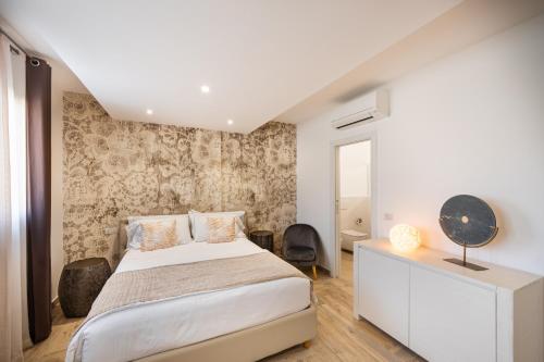 Ένα ή περισσότερα κρεβάτια σε δωμάτιο στο Suimi's Hotel
