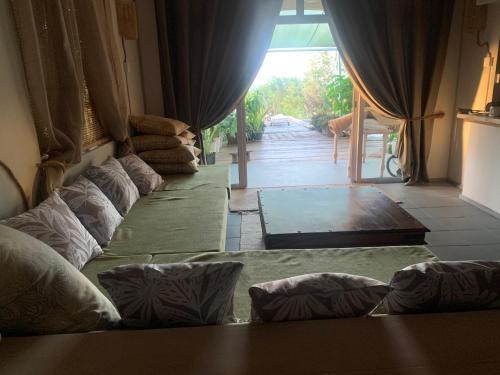 Ένα ή περισσότερα κρεβάτια σε δωμάτιο στο Tropical suite Ocean view