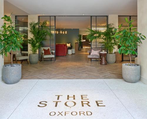 a lobby with a sign that reads the store oxford at The Store in Oxford