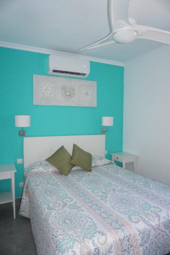 Postel nebo postele na pokoji v ubytování Bungalow Luisy