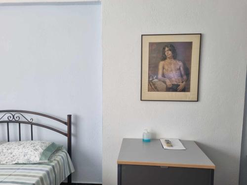 A bed or beds in a room at Houses in the Village