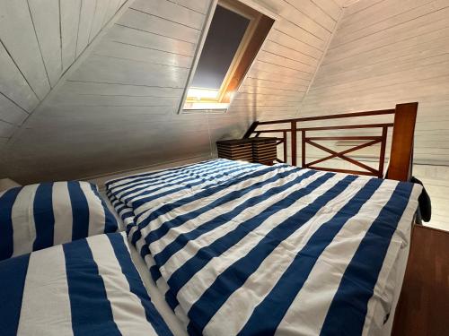 Postel nebo postele na pokoji v ubytování Tahiti sunshine - Chatka na vode