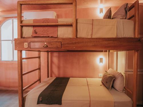 Cama o camas de una habitación en Casa Amate 61 - Mérida centro