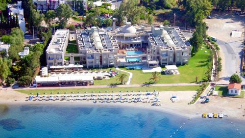 an aerial view of a resort on the beach at Hotel Ambrosia in Bitez