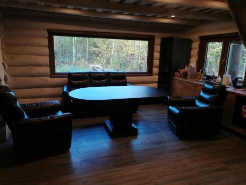 Coin salon dans l'établissement Rooslepa puhkemaja