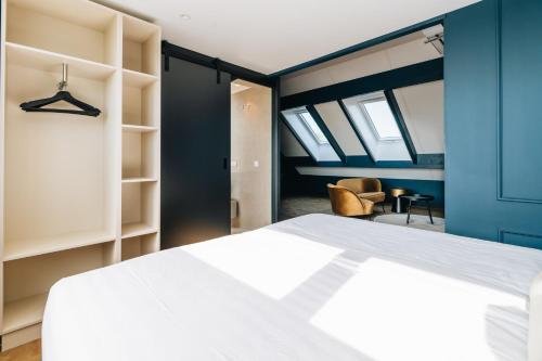 Ένα ή περισσότερα κρεβάτια σε δωμάτιο στο Hotel Renesse