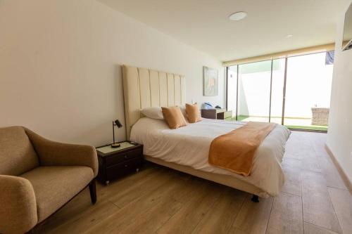 Ένα ή περισσότερα κρεβάτια σε δωμάτιο στο Alba Garden Suite