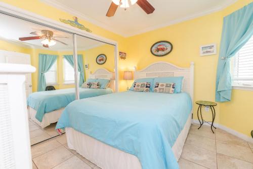 Postel nebo postele na pokoji v ubytování A Beachside Retreat