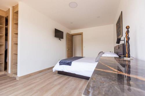 TV a/nebo společenská místnost v ubytování Alba Rooftop Suite