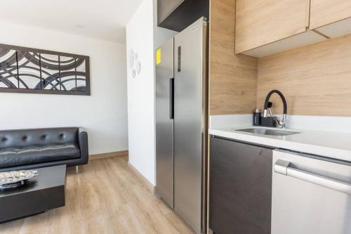 Kuchyň nebo kuchyňský kout v ubytování Alba Rooftop Suite