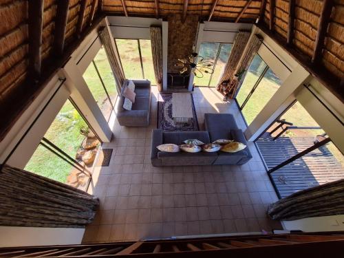 an overhead view of the living room of a house at Lakeview Cottage, Curry's Post - SOLAR POWERED in Howick