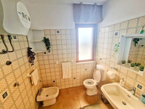 Ένα μπάνιο στο Relaxing italian seaside apartment