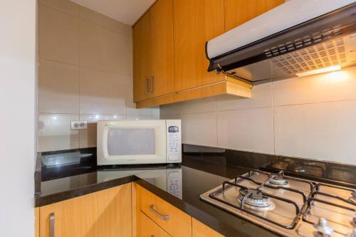 Dapur atau dapur kecil di Oasis Suite Rep Salvador