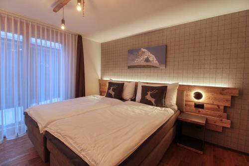 Chalet A la Casaにあるベッド