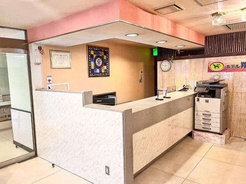 a lobby of a fast food restaurant with a counter at Hotel Sho Sapporo - Vacation STAY 53624v in Sapporo