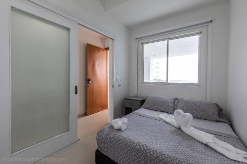 Cama o camas de una habitación en Edificio Retiro del Caribe 503