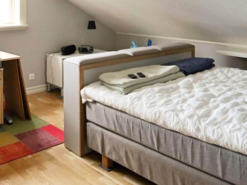 Säng eller sängar i ett rum på Holiday home Halmstad XII