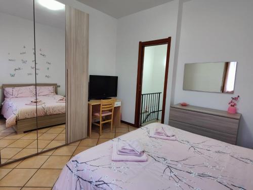 Postel nebo postele na pokoji v ubytování La Corte di Cris