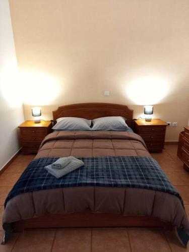 Ένα ή περισσότερα κρεβάτια σε δωμάτιο στο Spyros central apartment