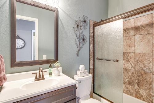 a bathroom with a toilet and a sink and a shower at Stunning Oro Valley Home Near Catalina State Park in Oro Valley