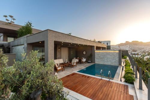 an image of a house with a swimming pool at Marje Villas Bodrum in Bodrum City