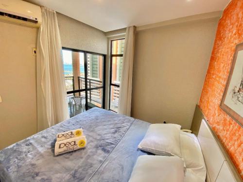 Voodi või voodid majutusasutuse Apart Hotel Brasil Tropical Meireles - By Ideal Trip toas