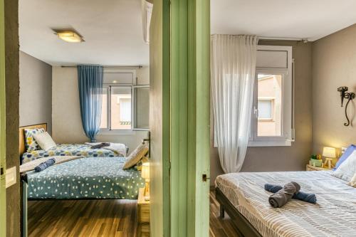 Posteľ alebo postele v izbe v ubytovaní La petite venise Empuriabrava Solarium Vue Mer, 2 Terrasses Clim Parking free Oc keys
