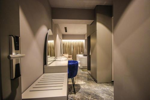 Postel nebo postele na pokoji v ubytování Atrium Hotel