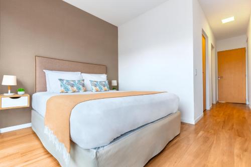 En eller flere senge i et værelse på Modern Apartments in Palermo - by BueRentals