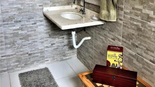 Koupelna v ubytování Sítio Aconchegante com Piscina e Wi-Fi