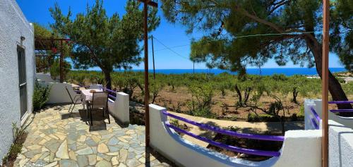 a view of the ocean from a house at Studios Crete in Ferma