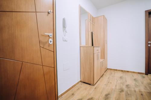 an empty room with a closet and a door at Darki Apartments 2 - Very Central Stay With Free Parking in Ohrid