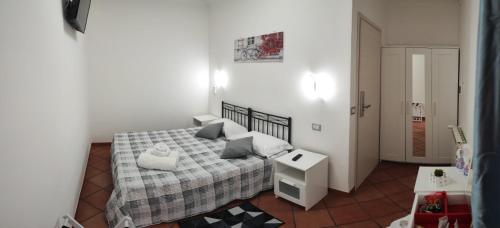 Postel nebo postele na pokoji v ubytování Royal House Fiumicino
