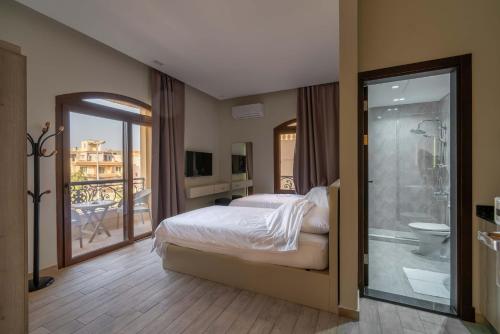 Postel nebo postele na pokoji v ubytování Sleep Inn Apart-Hotel