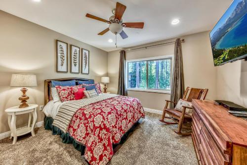 a bedroom with a bed and a ceiling fan at Tahoe Woods 502 at Stateline Lake Heavenly Village in South Lake Tahoe