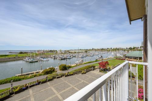 a view of a marina with boats in the water at Hotel Bellwether on Bellingham Bay in Bellingham