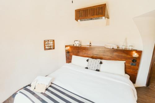Ένα ή περισσότερα κρεβάτια σε δωμάτιο στο Casa Ku Hotel - Adults Only