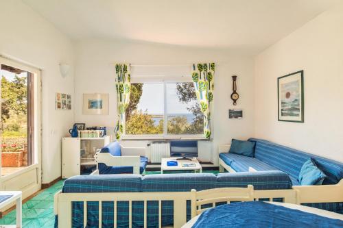 Χώρος καθιστικού στο Amazing villa in a unique mediterranean island!