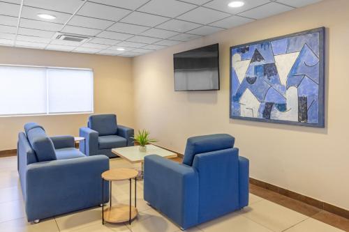 TV a/nebo společenská místnost v ubytování City Express by Marriott Ciudad Obregon