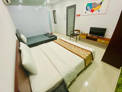 GIANG HÂN HOTELにあるベッド