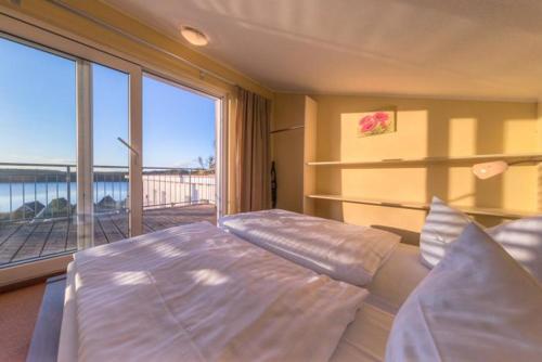 Postel nebo postele na pokoji v ubytování Eisvogel Classic 304