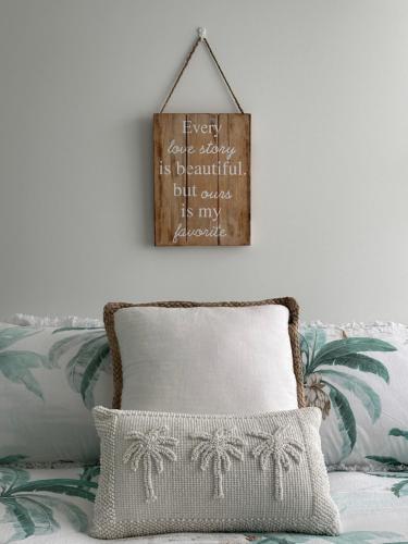 Postel nebo postele na pokoji v ubytování Bella @ Ohana