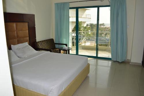 Кровать или кровати в номере Hotel Mishuk