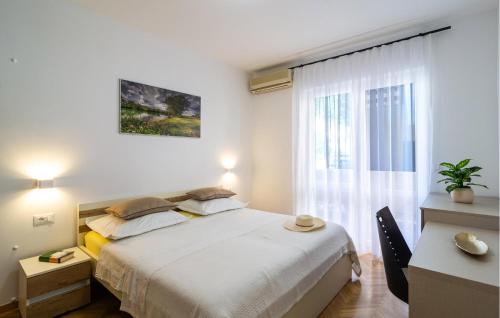 Krevet ili kreveti u jedinici u objektu 3 Bedroom Cozy Apartment In Krilo Jesenice