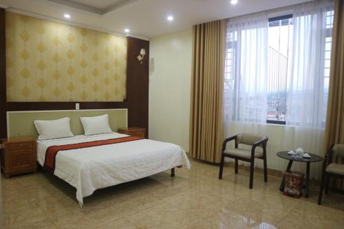 Postel nebo postele na pokoji v ubytování An Khang Hotel
