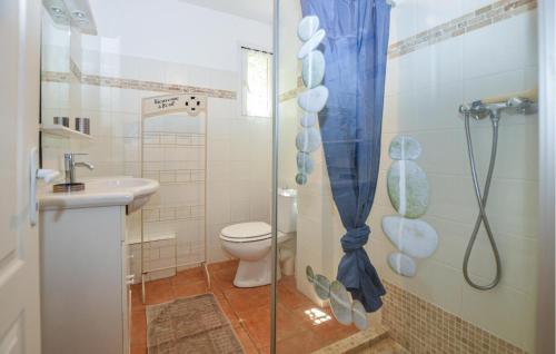 a bathroom with a shower with a toilet and a sink at 2 Bedroom Lovely Home In Piscia Rossa in Afa