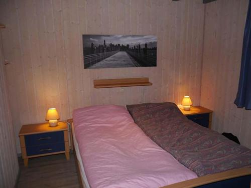 Postel nebo postele na pokoji v ubytování Wildgans 269