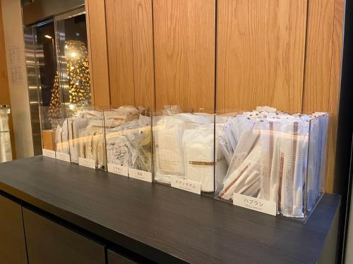 a display case filled with lots of white packages at Glansit Akihabara in Tokyo
