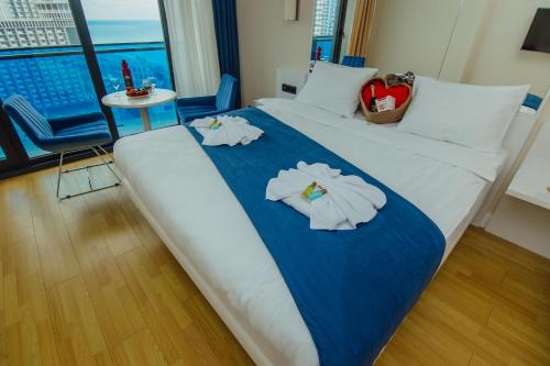 Vuode tai vuoteita majoituspaikassa Orbi Hotel City Batumi Sea View