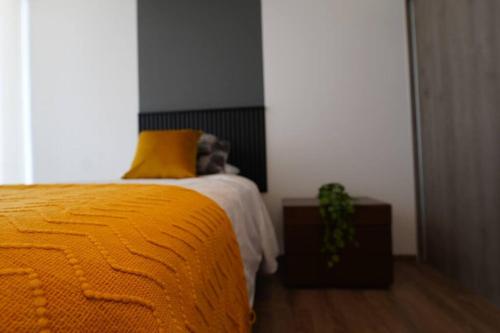 Cama o camas de una habitación en Dep moderno con la mejor vista de Querétaro